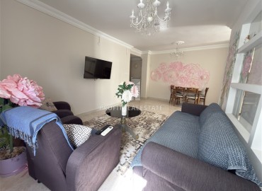 Меблированная квартира с двумя спальнями, 100м², в доме с парковкой в районе Махмутлар, Алания ID-19211 фото-2