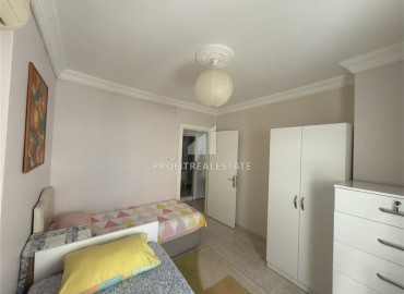 Меблированная квартира с двумя спальнями, 100м², в доме с парковкой в районе Махмутлар, Алания ID-19211 фото-10