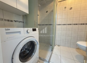 Меблированная квартира с двумя спальнями, 100м², в доме с парковкой в районе Махмутлар, Алания ID-19211 фото-12