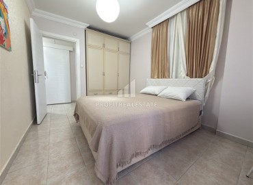 Меблированная квартира с двумя спальнями, 100м², в доме с парковкой в районе Махмутлар, Алания ID-19211 фото-14