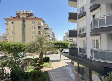 Меблированная квартира с двумя спальнями, 100м², в доме с парковкой в районе Махмутлар, Алания ID-19211 фото-17