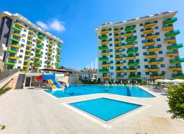 Двухкомнатные апартаменты с видом на море, 55м² в комплексе премиум-класса в районе Авсаллар, Алания ID-19213 фото-1