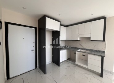 Двухкомнатные апартаменты с видом на море, 55м² в комплексе премиум-класса в районе Авсаллар, Алания ID-19213 фото-4
