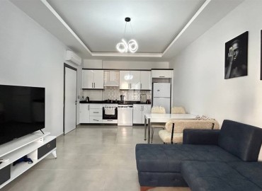 Уютная квартира с одной спальней, 55м², в комплексе с инфраструктурой, в 700м от моря в Махмутларе, Алания ID-19214 фото-2