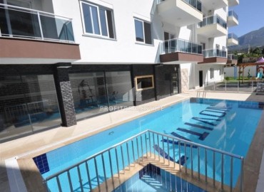 Уютная квартира с одной спальней, 55м², в комплексе с инфраструктурой, в 700м от моря в Махмутларе, Алания ID-19214 фото-18
