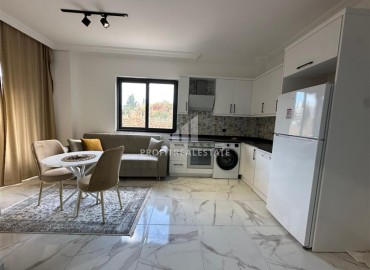 Симпатичная двухкомнатная квартира, 42,5м², в новой резиденции с зимней инфраструктурой в районе Оба, Алания ID-19215 фото-1
