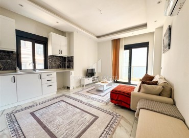 Меблированная двухкомнатная квартира, 55м², в комплексе с инфраструктурой в районе Махмутлар, Алания ID-19219 фото-3