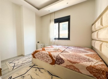 Меблированная двухкомнатная квартира, 55м², в комплексе с инфраструктурой в районе Махмутлар, Алания ID-19219 фото-6