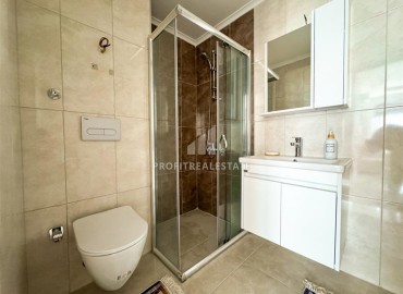 Меблированная двухкомнатная квартира, 55м², в комплексе с инфраструктурой в районе Махмутлар, Алания ID-19219 фото-8