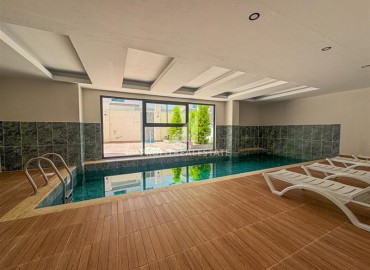 Меблированная двухкомнатная квартира, 55м², в комплексе с инфраструктурой в районе Махмутлар, Алания ID-19219 фото-12