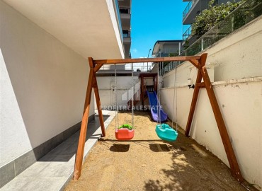 Меблированная двухкомнатная квартира, 55м², в комплексе с инфраструктурой в районе Махмутлар, Алания ID-19219 фото-15