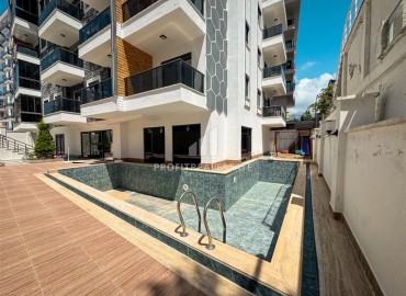 Меблированная двухкомнатная квартира, 55м², в комплексе с инфраструктурой в районе Махмутлар, Алания ID-19219 фото-18