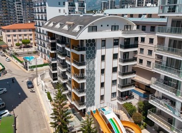 Меблированная двухкомнатная квартира, 55м², в комплексе с инфраструктурой в районе Махмутлар, Алания ID-19219 фото-19