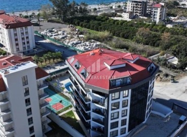 Готовая к проживанию, квартира 1+1, 55м², в комфортабельной новостройке в 50м от моря, Кестель, Алания ID-19220 фото-1