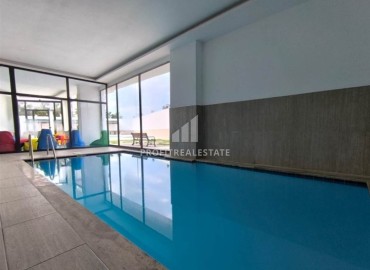 Готовая к проживанию, квартира 1+1, 55м², в комфортабельной новостройке в 50м от моря, Кестель, Алания ID-19220 фото-9