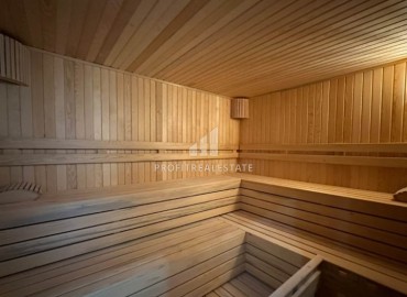 Готовая к проживанию, квартира 1+1, 55м², в комфортабельной новостройке в 50м от моря, Кестель, Алания ID-19220 фото-10