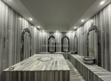 Готовая к проживанию, квартира 1+1, 55м², в комфортабельной новостройке в 50м от моря, Кестель, Алания ID-19220 фото-11