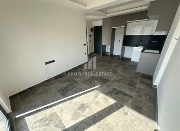 Двухкомнатные апартаменты, 55м², с чистовой отделкой в резиденции премиум класса в Махмутларе, Алания ID-19221 фото-2
