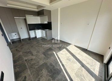 Двухкомнатные апартаменты, 55м², с чистовой отделкой в резиденции премиум класса в Махмутларе, Алания ID-19221 фото-3