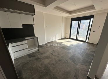 Двухкомнатные апартаменты, 55м², с чистовой отделкой в резиденции премиум класса в Махмутларе, Алания ID-19221 фото-5