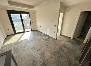 Двухкомнатные апартаменты, 55м², с чистовой отделкой в резиденции премиум класса в Махмутларе, Алания ID-19221 фото-6