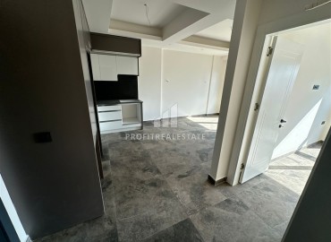 Двухкомнатные апартаменты, 55м², с чистовой отделкой в резиденции премиум класса в Махмутларе, Алания ID-19221 фото-7