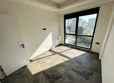 Двухкомнатные апартаменты, 55м², с чистовой отделкой в резиденции премиум класса в Махмутларе, Алания ID-19221 фото-9