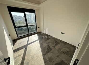 Двухкомнатные апартаменты, 55м², с чистовой отделкой в резиденции премиум класса в Махмутларе, Алания ID-19221 фото-10