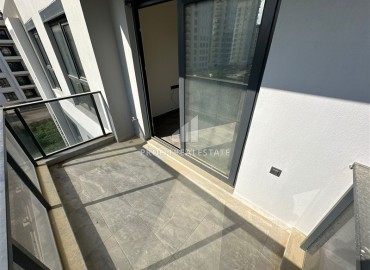 Двухкомнатные апартаменты, 55м², с чистовой отделкой в резиденции премиум класса в Махмутларе, Алания ID-19221 фото-13