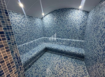 Двухкомнатные апартаменты, 55м², с чистовой отделкой в резиденции премиум класса в Махмутларе, Алания ID-19221 фото-20