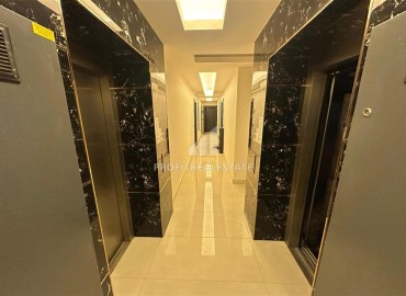 Двухкомнатные апартаменты, 55м², с чистовой отделкой в резиденции премиум класса в Махмутларе, Алания ID-19221 фото-24