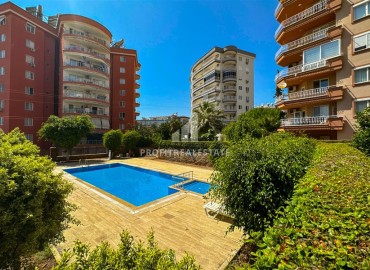 Апартаменты 2+1 с дизайнерским интерьером, 110м², в уютной резиденции в 350м от моря, в районе Алании Тосмур под ВНЖ ID-19224 фото-1
