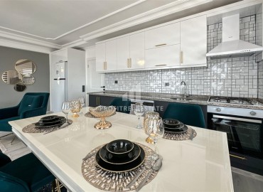 Апартаменты 2+1 с дизайнерским интерьером, 110м², в уютной резиденции в 350м от моря, в районе Алании Тосмур под ВНЖ ID-19224 фото-6