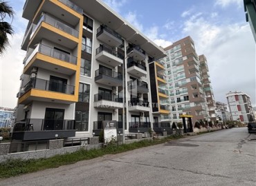 Двухкомнатная квартира, 55м², в резиденции с хорошей инфраструктурой в 500м от моря в Махмутларе, Алания ID-19225 фото-1