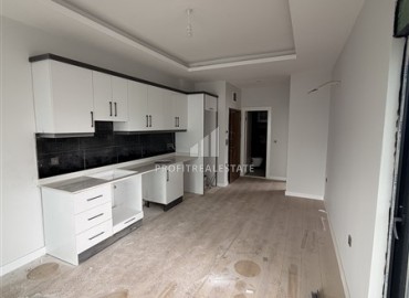 Двухкомнатная квартира, 55м², в резиденции с хорошей инфраструктурой в 500м от моря в Махмутларе, Алания ID-19225 фото-3
