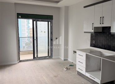 Двухкомнатная квартира, 55м², в резиденции с хорошей инфраструктурой в 500м от моря в Махмутларе, Алания ID-19225 фото-5