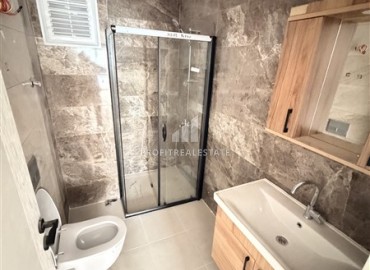 Двухкомнатная квартира, 55м², в резиденции с хорошей инфраструктурой в 500м от моря в Махмутларе, Алания ID-19225 фото-7
