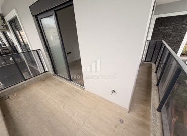 Двухкомнатная квартира, 55м², в резиденции с хорошей инфраструктурой в 500м от моря в Махмутларе, Алания ID-19225 фото-10