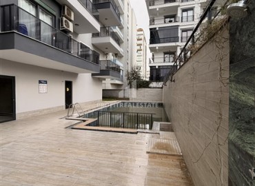 Двухкомнатная квартира, 55м², в резиденции с хорошей инфраструктурой в 500м от моря в Махмутларе, Алания ID-19225 фото-13
