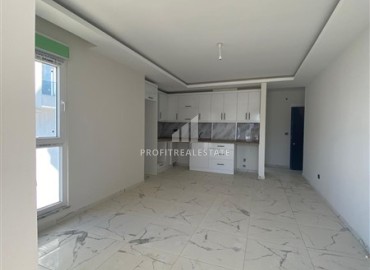 Квартира с одной спальней, 55м², в новом комплексе с бассейном в 500м от моря в Каргыджаке, Алания ID-19229 фото-1