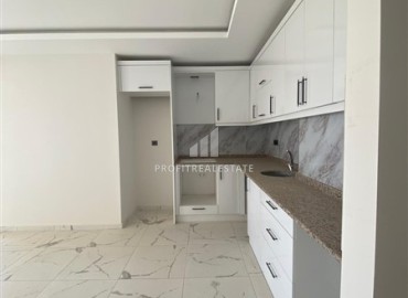 Квартира с одной спальней, 55м², в новом комплексе с бассейном в 500м от моря в Каргыджаке, Алания ID-19229 фото-2