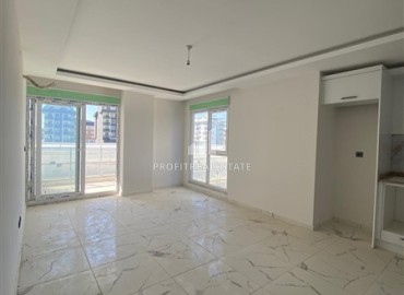 Квартира с одной спальней, 55м², в новом комплексе с бассейном в 500м от моря в Каргыджаке, Алания ID-19229 фото-3