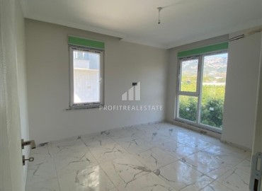 Квартира с одной спальней, 55м², в новом комплексе с бассейном в 500м от моря в Каргыджаке, Алания ID-19229 фото-5