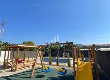 Квартира с одной спальней, 55м², в новом комплексе с бассейном в 500м от моря в Каргыджаке, Алания ID-19229 фото-9