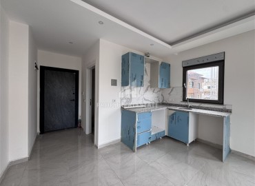 Двухкомнатные апартаменты, 50м² в новом комплексе с бассейном в 200м от моря в центре Алании с возможностью ВНЖ ID-19230 фото-5