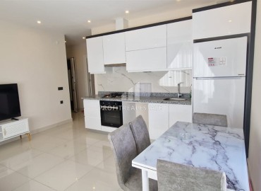 Укомплектованная квартира 2+1, 90м² с видом на горы в комфортабельном комплексе в Махмутларе, Алания ID-19231 фото-3