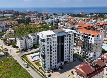 Элегантные апартаменты с одной спальней, 55м², с видом на море в комплексе премиум класса в районе Авсаллар, Алания ID-19234 фото-1