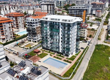Элегантные апартаменты с одной спальней, 55м², с видом на море в комплексе премиум класса в районе Авсаллар, Алания ID-19234 фото-2