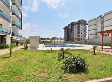 Элегантные апартаменты с одной спальней, 55м², с видом на море в комплексе премиум класса в районе Авсаллар, Алания ID-19234 фото-25
