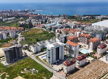 Элегантные апартаменты с одной спальней, 55м², с видом на море в комплексе премиум класса в районе Авсаллар, Алания ID-19234 фото-26